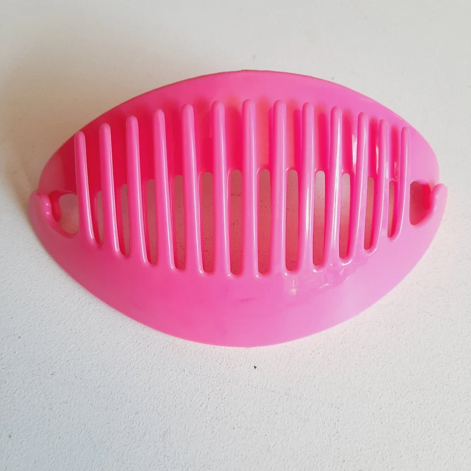 Clip ceñidor de pelo vintage plátano peine soporte alas Hollywood, CA EE. UU. Foto 1 de 1