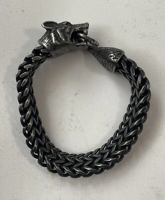 Pulsera de lobo mordiendo cola Foto 1 de 4