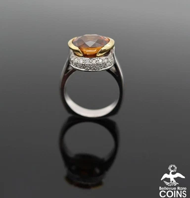 Anillo de topacio naranja ovalado de oro blanco y amarillo de 18 quilates con diamantes de 0,17 quilates y 3,85 quilates Foto 1 de 4