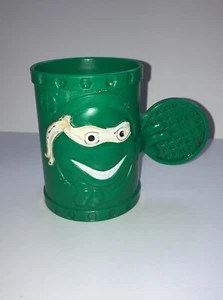 Teenage Mutant Ninja Turtles City 1991 alcantarillado plástico taza verde mango de alcantarillado TMNT - Imagen 1 de 2