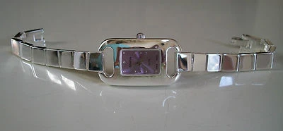 RELOJ INFORMAL ELEGANTE ESFERA LAVANDA ACABADO PLATEADO GINEBRA MODA MUJER Foto 1 de 4