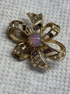 goldfarbene Brosche Anstecknadel mit doppelter Funktion Schleife und rosa Stein - Bild 1 von 3