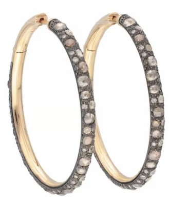 Pendientes tipo argolla Pomellato de tango con diamantes talla oro 18k precio regular 30k Foto 1 de 4