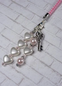 Bracelet lanière breloque téléphone portable coeur cristal verre fait main rose blanc neuf - Photo 1 sur 3