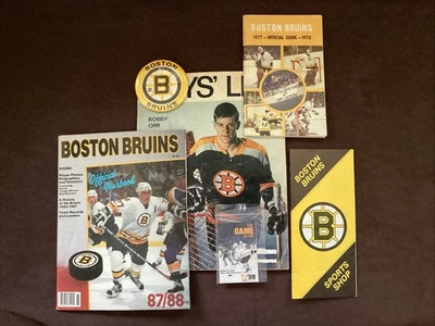 Boston Bruins Lot: 77/78 Guide, 87/88 Program, Boys’ Life, Schedule, Flyer & Pin - Image 1 of 4