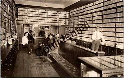 Real Photo Interior Shoe Store w/ Giant Wall Of Shoes Peoria IL RP RPPC N353 - Image 1 of 4