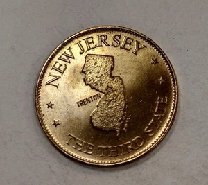 Moneda ficha juego de petróleo Shell 1969 Estados de la Unión de bronce - Nueva Jersey - Imagen 1 de 6