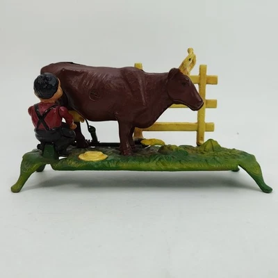Vintage Cast Iron Book of Knowledge Kicking Milking Cow Mechanical Bank WORKING - Image 1 of 4