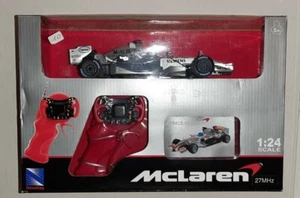 Modello Mc Laren R/C Formula 1 1:24 Kimi Raikkonen con telecomando 27MHz - New - Foto 1 di 4