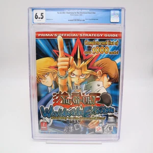 GBA PRIMA STRATEGY GUIDE - YU-GI-OH: STAIRWAY TO DESTINED DUEL - CGC GRADED 6.5 - Picture 1 of 10