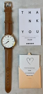 Reloj de cuarzo Cluse esfera blanca redondo tono dorado correa de cuero marrón NUEVO - Imagen 1 de 4