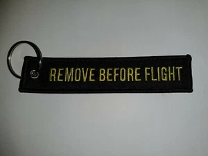 Remove Before Flight  - Schwarz/Gelb - Schlüsselanhänger - Neu  - Bild 1 von 1