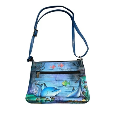 Bolso Bandolera Anuschka Cuero Pintado a Mano Azul Océano Delfín Tropical Foto 1 de 4