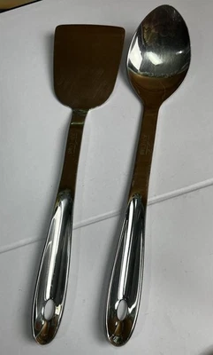 Juego de 2 piezas de utensilios de cocina con cuchara y espátula maciza de acero inoxidable totalmente revestidos Foto 1 de 4