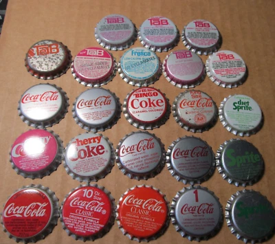 23 NOS  DIF COCA COLA BOTTLING COKE TAB SPRITE UNUSED SODA BOTTLE CAPS LOT 1 Foto 1 de 4
