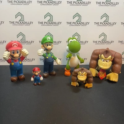 2010 Nintendo Super Mario Bros. Donkey Kong Yoshi Luigi Mario Action Figures Set - Image 1 of 4
