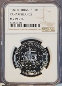 1989 PORTUGAL SILVER 100 ESCUDOS CANARY ISLANDS NGC MS 69 DPL TOP POP - Picture 1 of 3