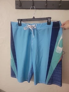 OAKLEY MEN'S BOARD SHORTS BLUE Sz 36 stretch Performance SWIM suit - Picture 1 of 5