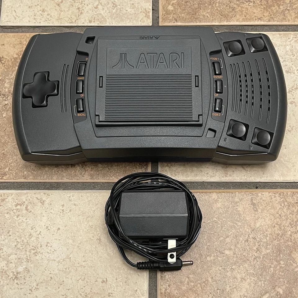 Sistema portátil Atari Lynx II PAG-0401 con cubierta de batería + cable de alimentación FUNCIONAMIENTO PROBADO Foto 1 de 4