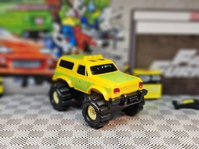 vintage yellow Chevy Blazer Stompers Mini 4x4 Loose Diecast Pickup Truck Shaper  - Image 1 of 4