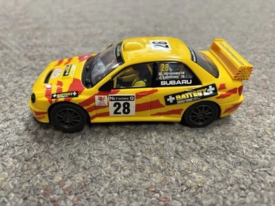+ Hornby Escala 1:32 Amarillo # 28 Red Q Subaru Impreza Slot Car Probado y Funciona Foto 1 de 4