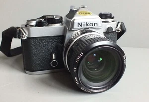 BEL APPAREIL PHOTO NIKON FE + NIKKOR 35MM 1.2 - ENTIEREMENT REVISE & NETTOYE !! - Photo 1 sur 12