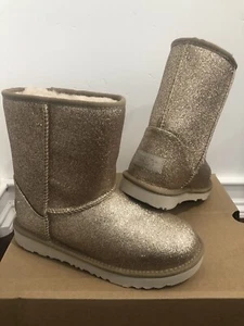 BOTAS UGG CLASSIC SHORT II GLITTER GOLD NIÑA TALLA 4 - Imagen 1 de 7