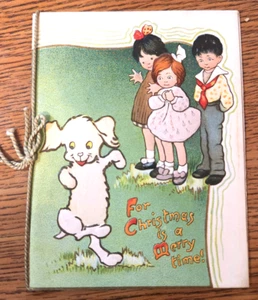 CHRISTMAS IS A MERRY TIME 3 Reloj para Niños Perro Blanco Baila Atwell Tuck Folleto - Imagen 1 de 3