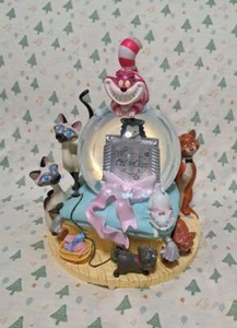 Unused Disney Alice In Wonderland Snow Globe Music Box Cheshire Cat - Picture 1 of 3