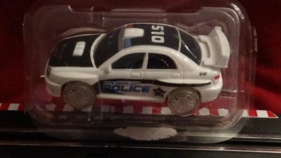 Escala 1:43 Spin Drive POLICE SLOT CAR NOS, Ruedas Iluminadas (LISTO PARA CARRERAS) Foto 1 de 4