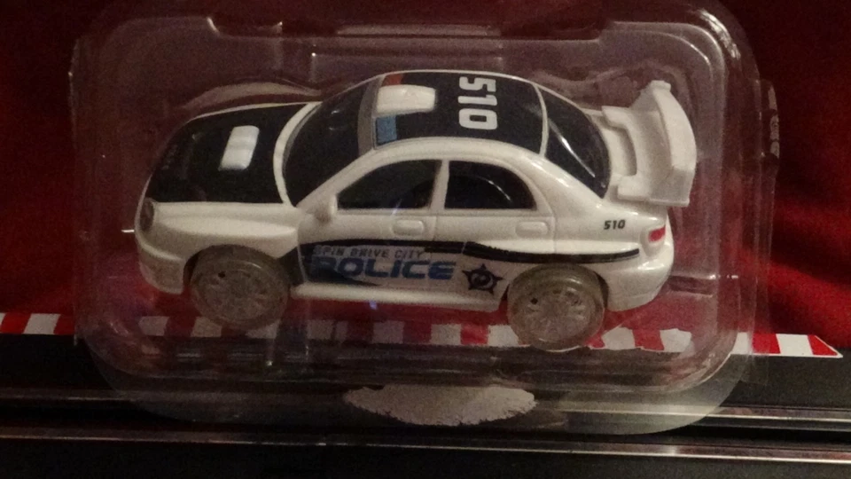 Escala 1:43 Spin Drive POLICE SLOT CAR NOS, Ruedas Iluminadas (LISTO PARA CARRERAS) Foto 1 de 4