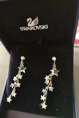 Swarovski Orecchini pendenti/punto luce stelline 2011 cod 105830 - Immagine 1 di 4