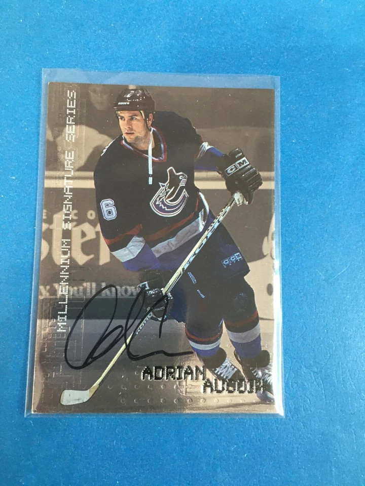 Autógrafos F145.188 1999-00 BAP Millennium #238 Adrian Aucoin canucks - Imagem 1 de 1