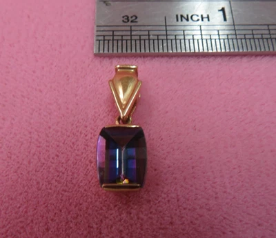 Colgante de topacio místico de oro amarillo macizo de 14K - 1,65 gramos Foto 1 de 4