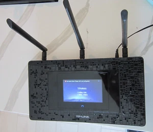 TP-LINK RE590T 1900 Mbps Desktop Wireless Extender - Picture 1 of 7