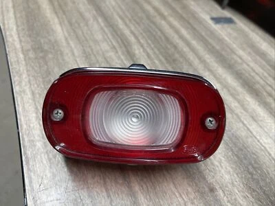 Carcasa y lente de luz inversa Mercury Montclair Monterey 1964 OEM SAE-TSDBR-64MY Foto 1 de 4