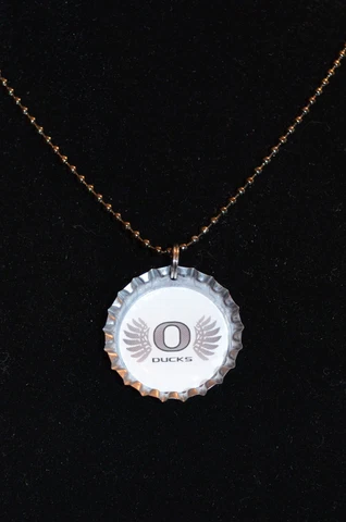 University of Oregon Ducks Feather 28" Bottle Cap Necklace - NEW Cover