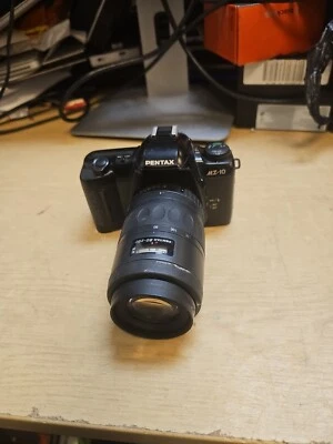Pentax MZ-10 con lente Pentax 80-200 - 100% sin probar.  Foto 1 de 4