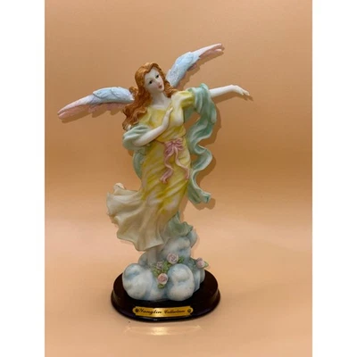 Estatuilla de ángel de la colección Yanglin vestido amarillo alas querubín estatua decoración Foto 1 de 4