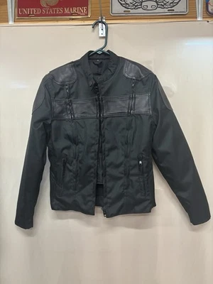 Chaqueta motera para mujer de cuero y textiles ventilada negra pequeña usada en excelente estado Foto 1 de 4