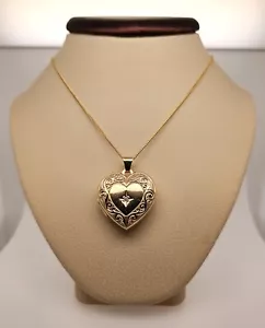 Ladies 14K Yellow Gold, Heart Locket with a 0.01ct. Round Diamond in the Center - Picture 1 of 6