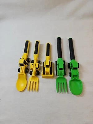 Utensilios de alimentación constructivos amarillo negro verde tenedor y cuchara topadora construcción Foto 1 de 4