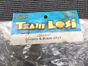 Team Losi 4107 Chassis & Brace XXXT LOSA4107 NOS P1 - Picture 1 of 3