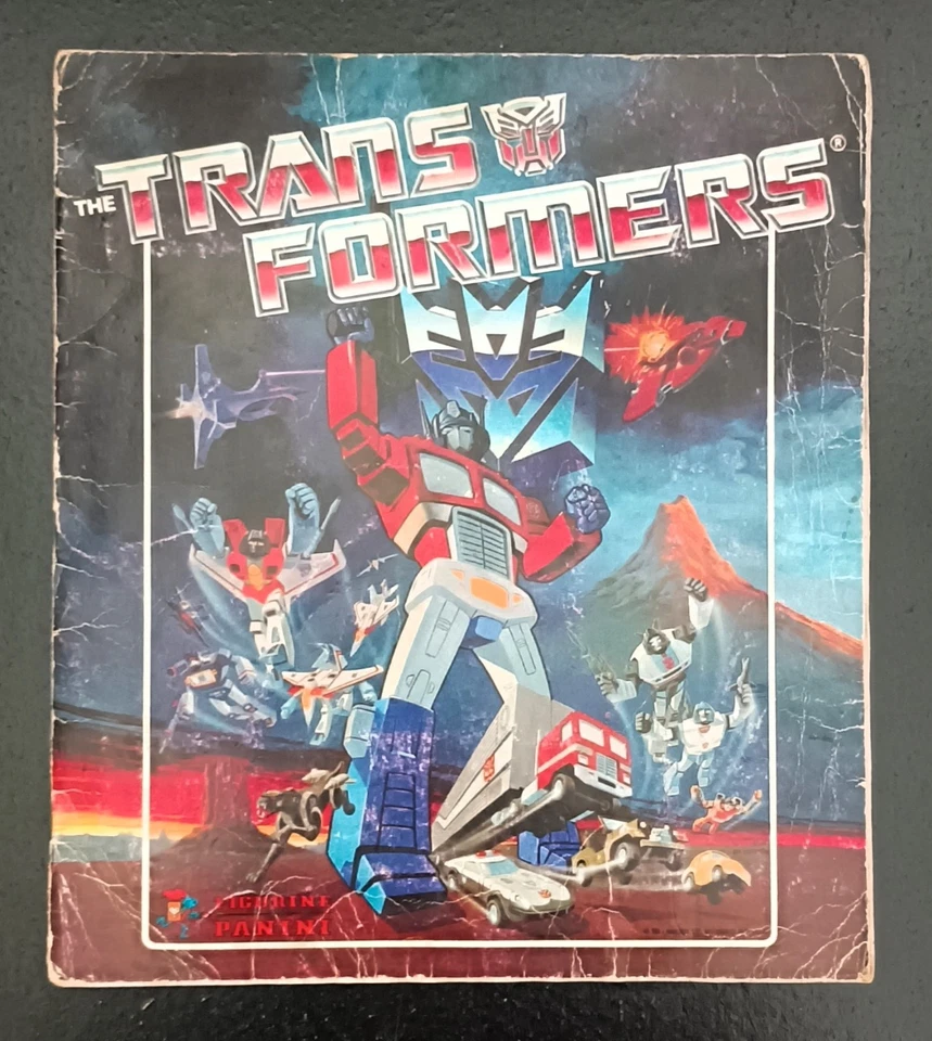 ÁLBUM DE PEGATINAS PANINI DE COLECCIÓN 1986 TRANSFORMERS G1 GRIEGO 100% COMPLETO PIGASOS Foto 1 de 4
