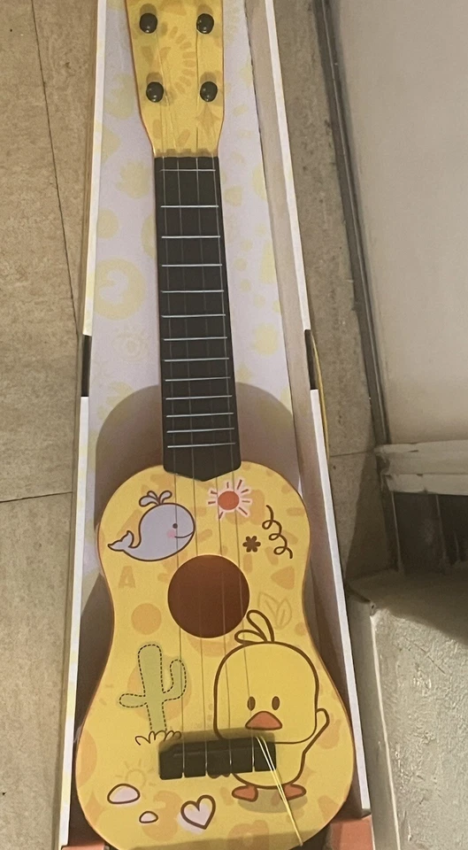 guitare enfant - Photo 1/1