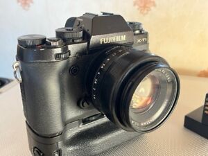 Fuji X-T1 Camera body with battery grip and flash