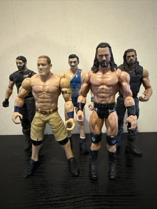 WWE Wrestling Figuren Konvolut Cena Rollins Reigns McIntyre B2 - Bild 1 von 1