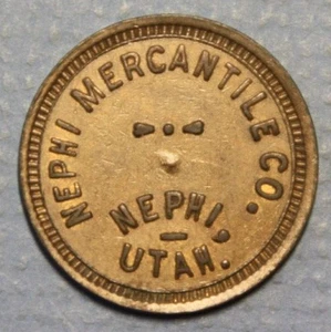 Nephi Utah Nephi Mercantile Good for 10c Merchandise Brass 22mm Round Token - Bild 1 von 2