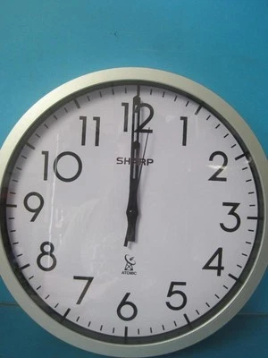 NEW SHARP ATOMIC ANALOG WALL CLOCK 12" SILVER BRUSHED FINISH SETS AUTOMATICALLY - Image 1 of 4