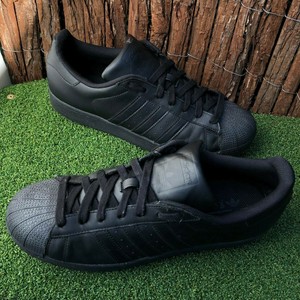 black suede adidas shell toes